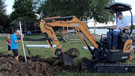 digging trench with mini excavator|youtube mini excavators digging.